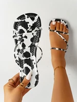 cow print criss cross toe post thong sandals