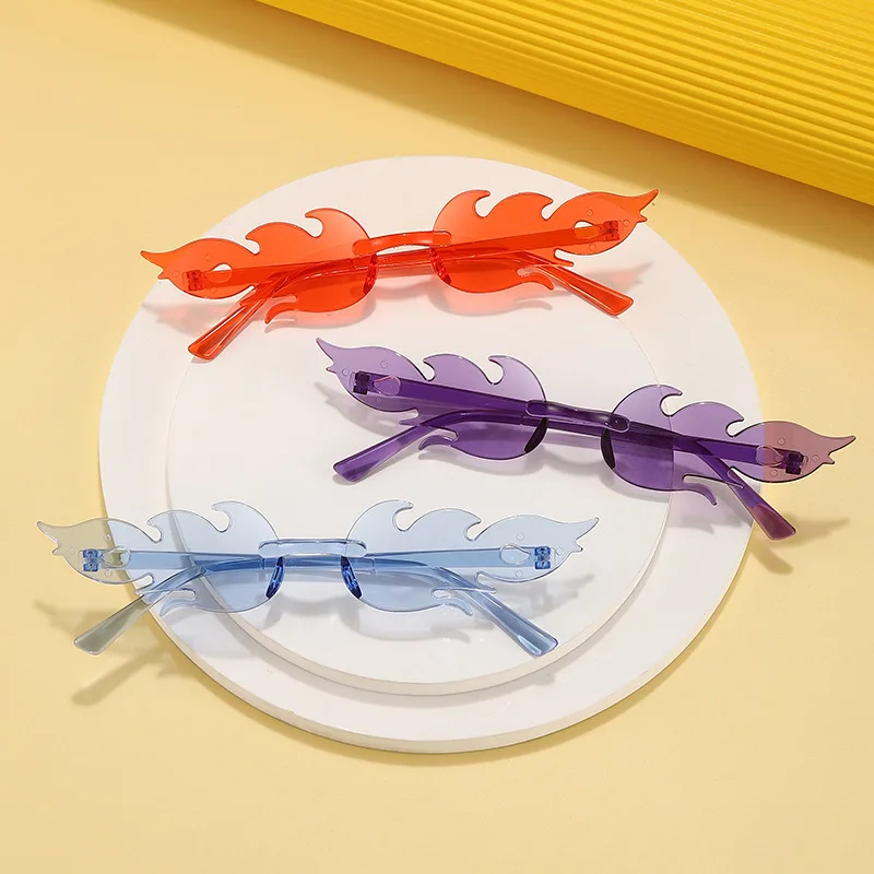 

Ju Li Rimless Women Sunglasses Fashion Flame Women Part Sunglasses Clear Colour UV400 Designer Sunglasses Trendy Cosplay Eyewear