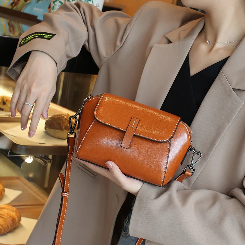 

Cowhide slung small bag female fashion Joker one-shoulder shell bag niche luxury leather handbag