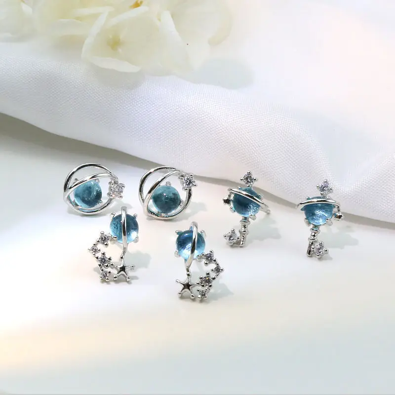 

Blue Starry Sky Crystal Earrings for Women Delicate Planet Moon Moon Keys Stud Earrings Girls Trendy Zircon Ear Stud Jewelry