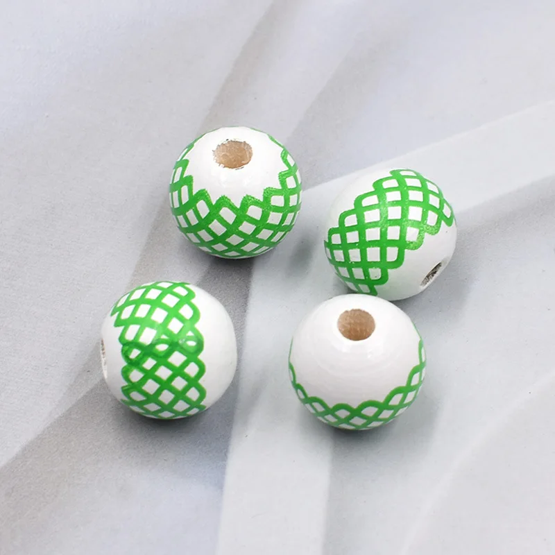 Натуральные бусины 16 мм деревянные с зеленым узором россыпью для рукоделия