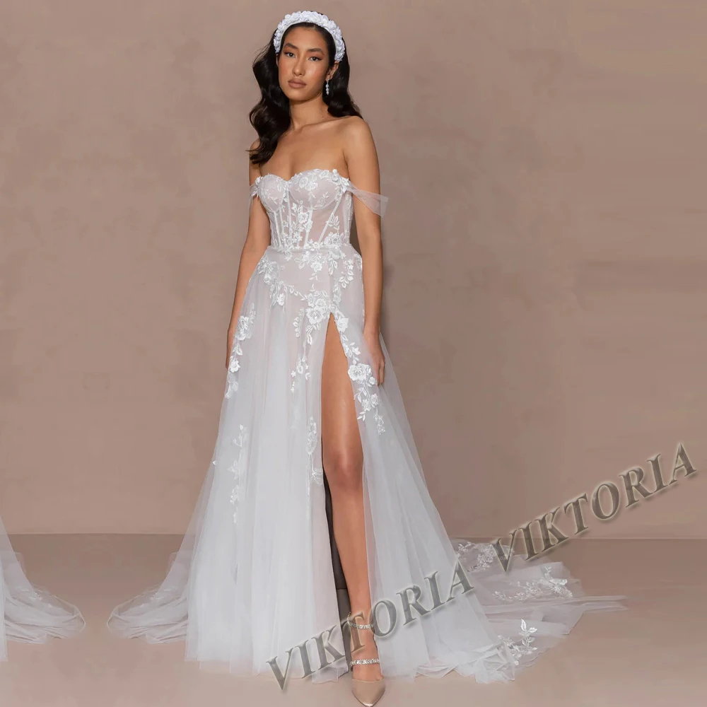 

Платье женское свадебное из фатина на пуговицах с аппликацией