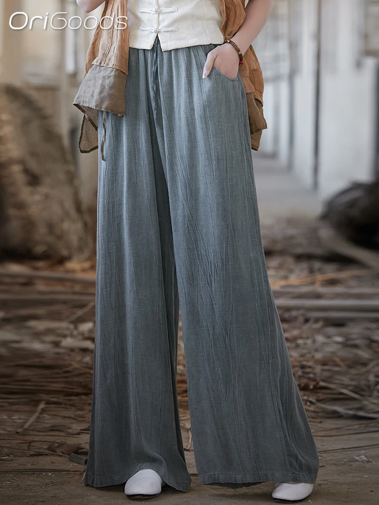 Женские широкие брюки из гладкой тонкой ткани с поясом на резинке