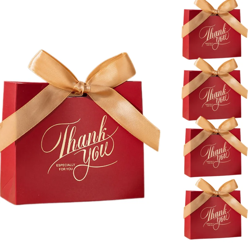 

Картонные подарочные пакеты с бантом