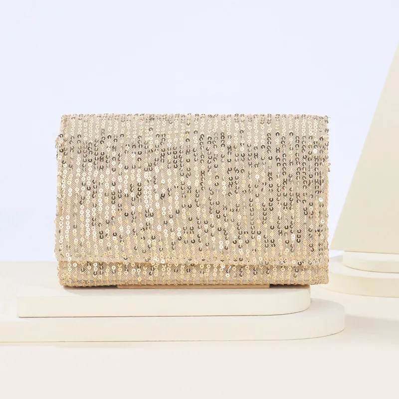 Модный вечерний клатч из коллекции со сверкающими блестками украшенная цепочкой