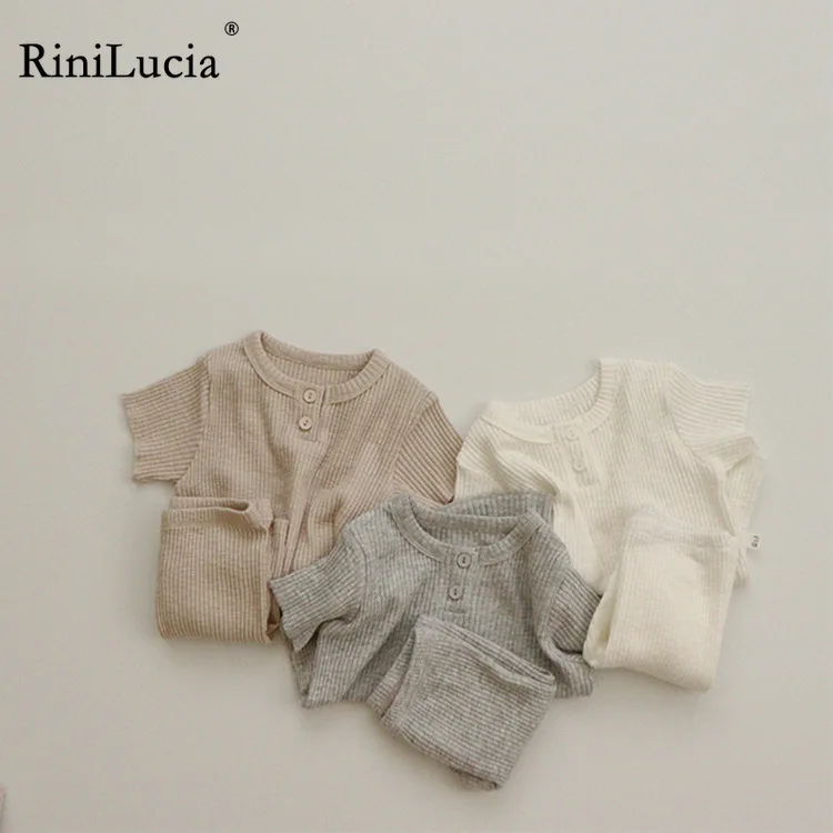 

RiniLucia Summer Baby Kids Pajama Suit 2023 New Solid Short Sleeve Shirts Shorts 2pcs Sleepwear Set Soft Girls Boys Pajama Set