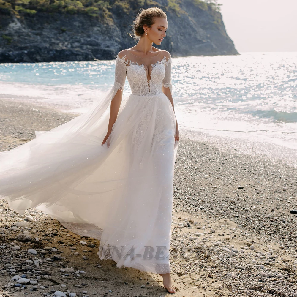 

Anna Beach Wedding Dress 2022 Mariages Court Train Deep V Neck Long Sleeve Applique Elegant Sparkly Tulle Button Illusion