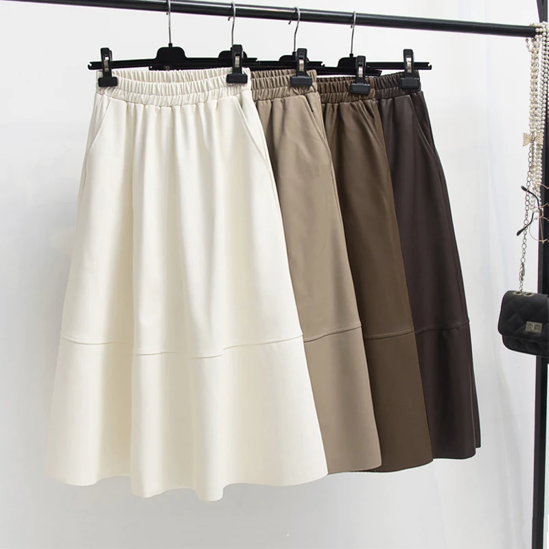 Юбка трапециевидная кофейная из экокожи с эластичным поясом и карманами |