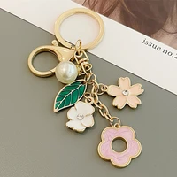 2022 cute sakura keyrings for women bag charm pendant creative pearl keychains fashion flower key chains car key ring wholesale