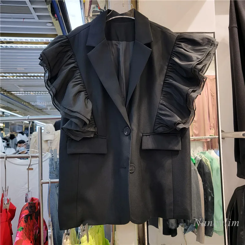 

2022 Spring Black Vest for Womens New Female Clothing Personality Stitching Lotus Leaf Sleeve Two Buttons Coat Waistcoats