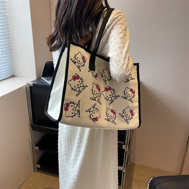 

2023 New Sanrio Large Capacity Kawaii Hello Kitty Canvas Bag Cartoon Print Hand Shopping Bag Versatile Mummy Tote Bag Gift