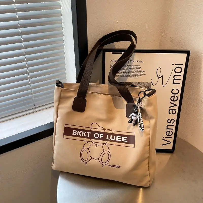 

2023 New Canvas Bag Women's Large Capacity Commuter Bag One Shoulder Crossbody Handheld Casual Versatile Tote Book Bag