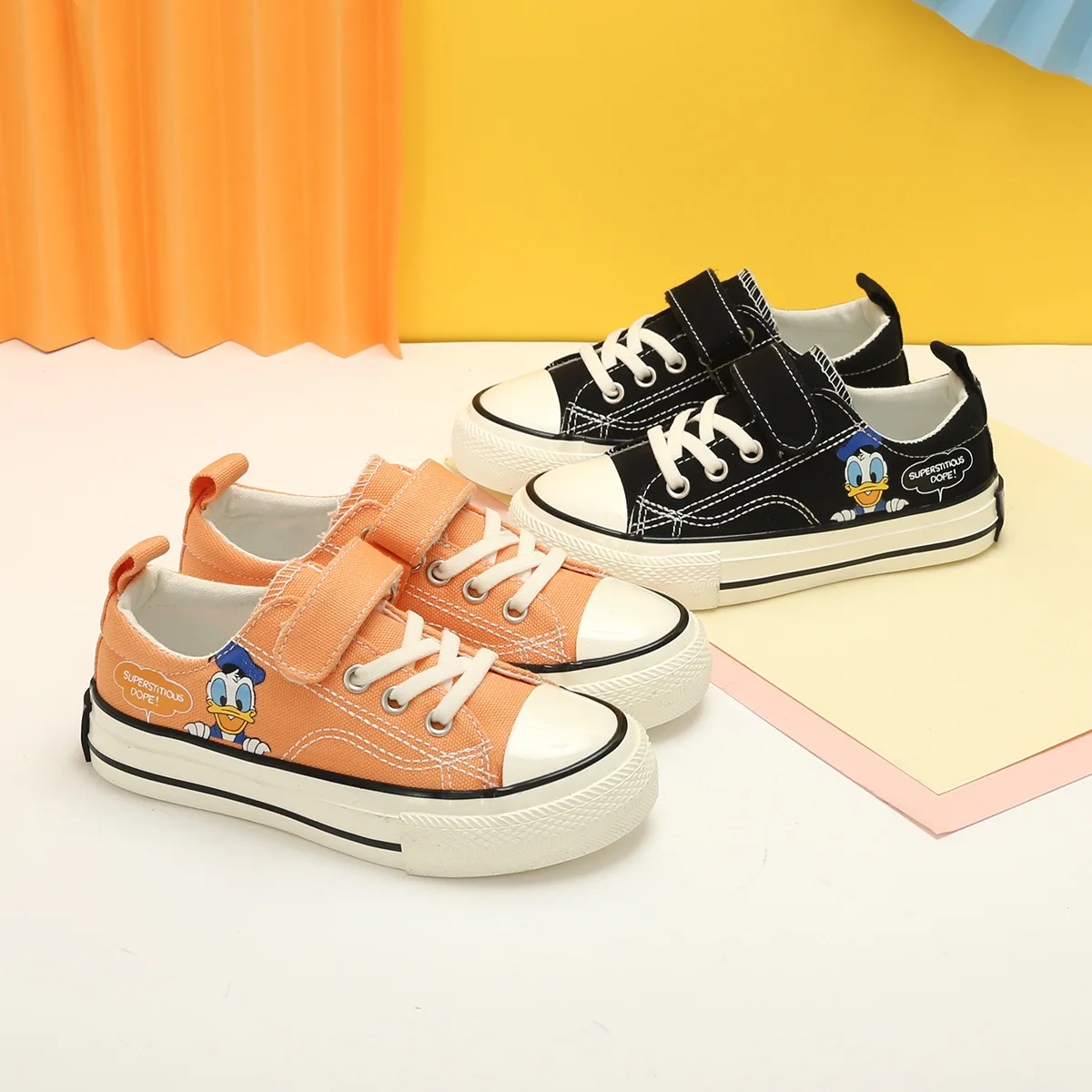 

Disney Donald Duck Canvas Children's Casual Shoes Women Low Upper Sneakers Orange Black Shoes For Girls Boys Size 24-36