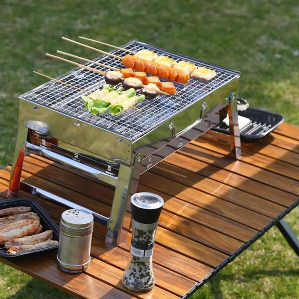 

Portable Folding BBQ Grill Stoves Outdoor Camping Picnic Stove Home Steel Charcoal BBQ Utensils Stainless Detachable Firewo O2I8
