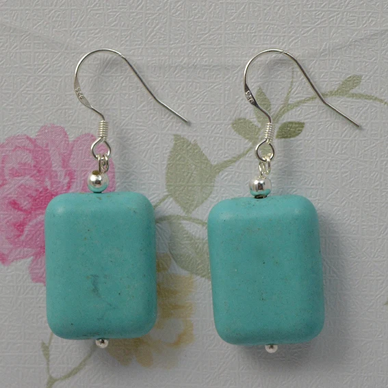 Серьги-подвески из серебра пробы с синей бирюзой