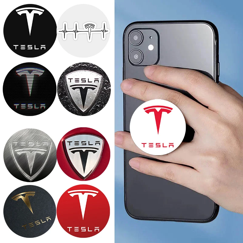 

Tesla Car Logo popped Phone Socket Folding Phone Holder Stand Phones Grip Mobile Phone Accessories Soporte Movil For iPhone