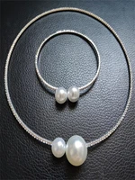 imitation pearl diamond encrusted open collar necklace bracelet two piece suit
