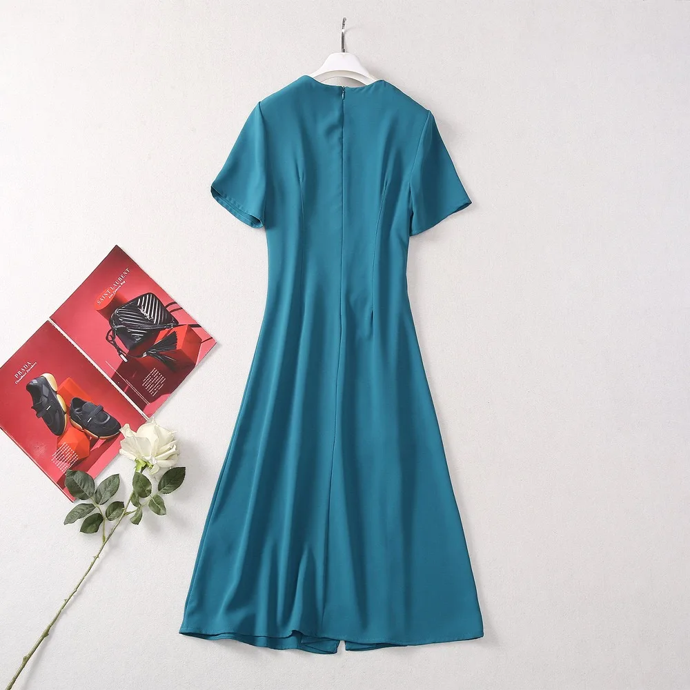 Женское платье с застежкой на талии модельное дизайнерское круглым вырезом и