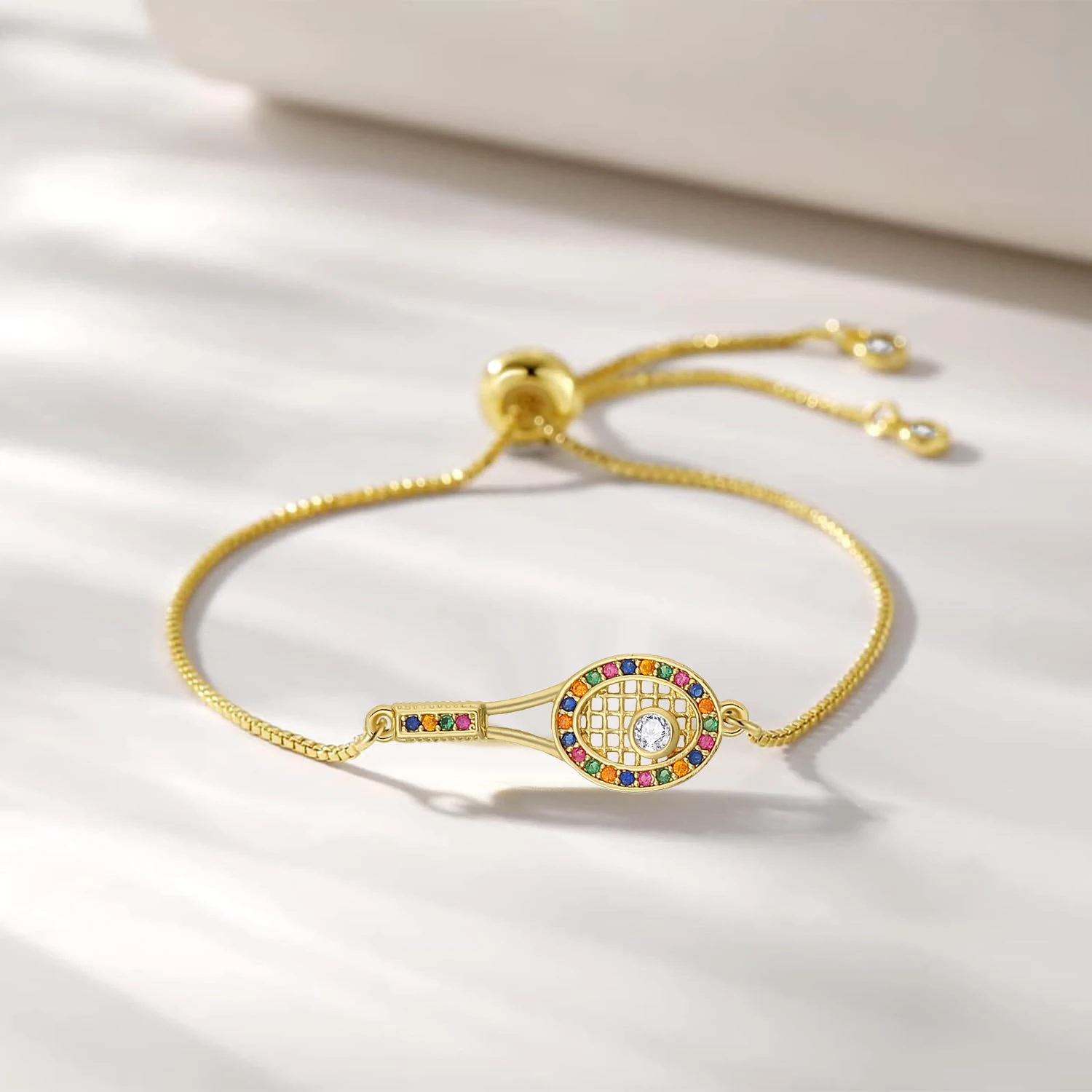 Женский браслет для теннисной ракетки с разноцветными фианитами 2024