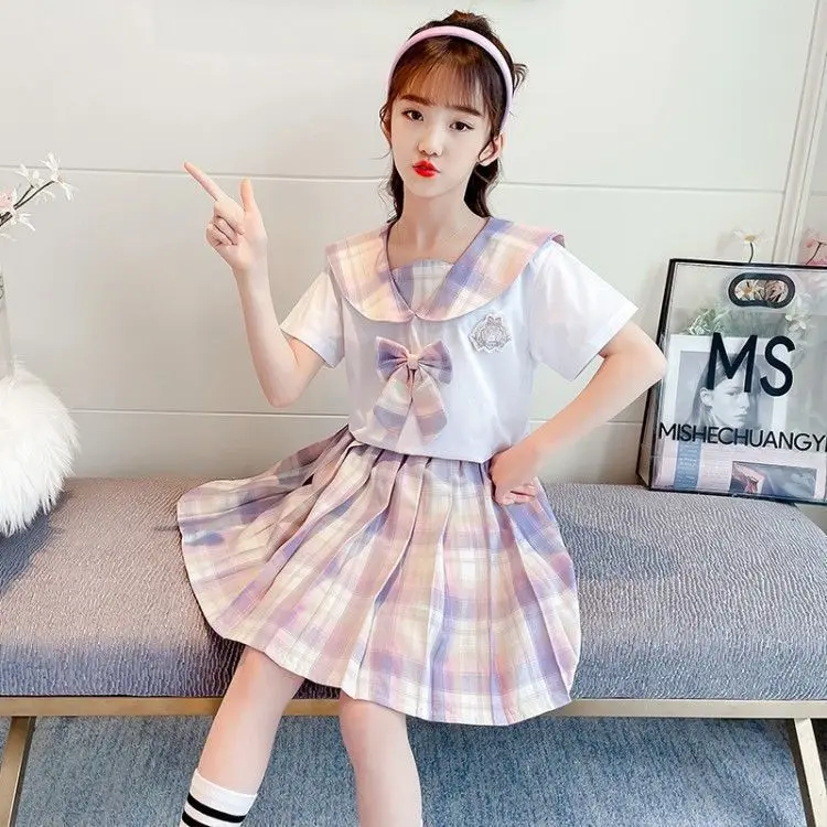 

2023 new teens Summer Fashion Child Primary School Girl JK Uniform Bow sailor Collar Blouse Shirt + Plaid Pleated Skirt 2pc/Set