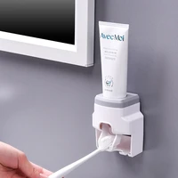 automatic toothpaste dispenser toothbrush holder set dustproof and sticky suction wall mounted bathroom toothpaste squeezer