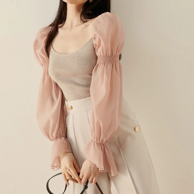 Женский свитер с пышными рукавами-фонариками и воротником-стойкой