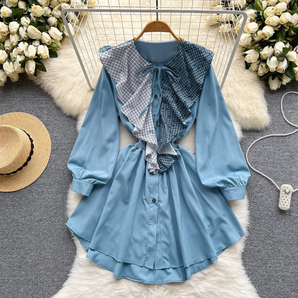 

Женское платье с рукавами-фонариками, круглым вырезом и поясом на резинке