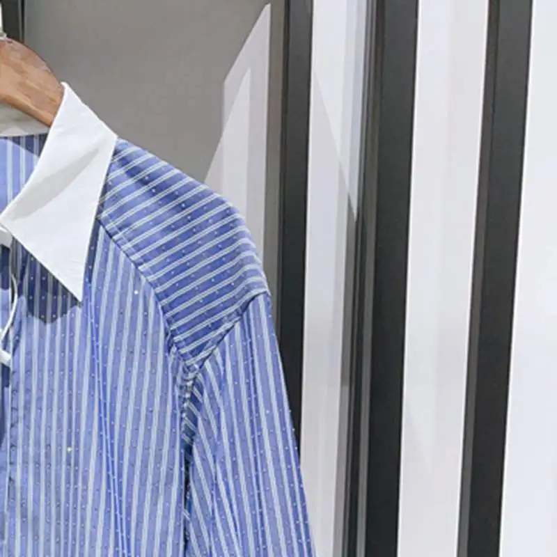 

2023 Early Autumn Blue Striped Color Contrast Lapel Dropped Shoulders Blouse Women Shirt