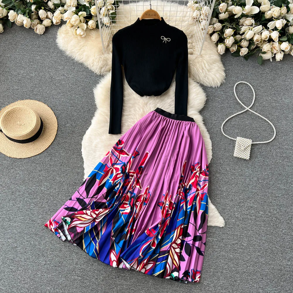 

Merchall Runway Knit 2 Pieces Set Autumn Women Long Sleeve Bow Black Knitted Tops and Floral Print Pleated Skirt Suit Female