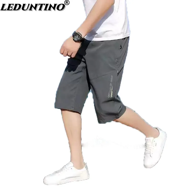 

M-8XL Плюс Размер Летние Шорты Из Шелка Льда Летние Мужские Карманные Молнии Свободные Штаны До Колена Быстросохнущие Спортивные Повседневны...