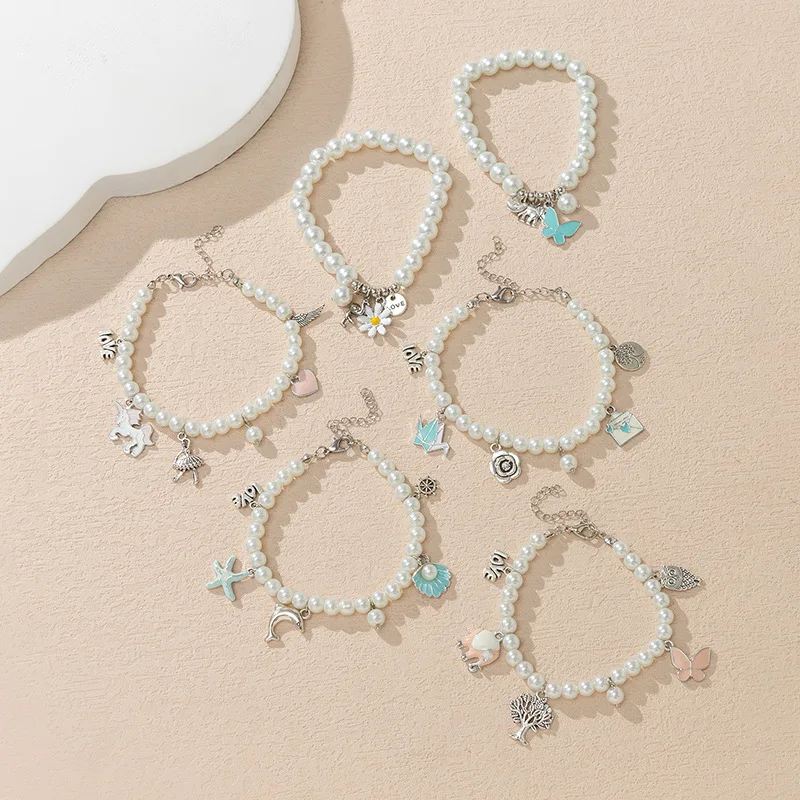 

Fashion Design Sense Cartoon Pendant Pearl Bracelet Female Ins Style Niche High-quality Dripping Bracelet