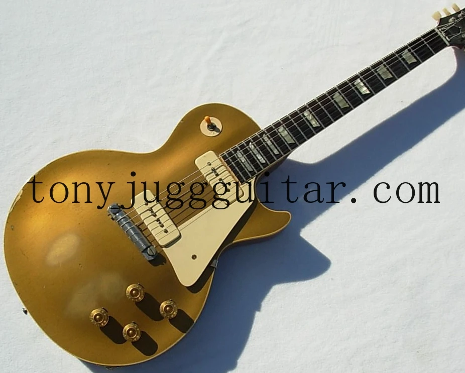 

Aged Goldtop Relic Gold Top Electric Guitar One Piece Mahogany Body, White P-90 Pickups, Chrome Hardware, Trapzoid Pearl Inlay