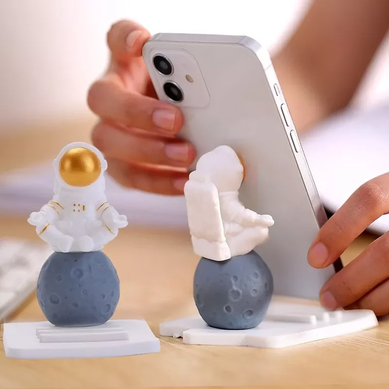 

Astronaut Phone Holder Desktop Silicone Cellphone Stand Dock Bracket Spaceman Model Universal Smartphone Base Stand Desk Decor