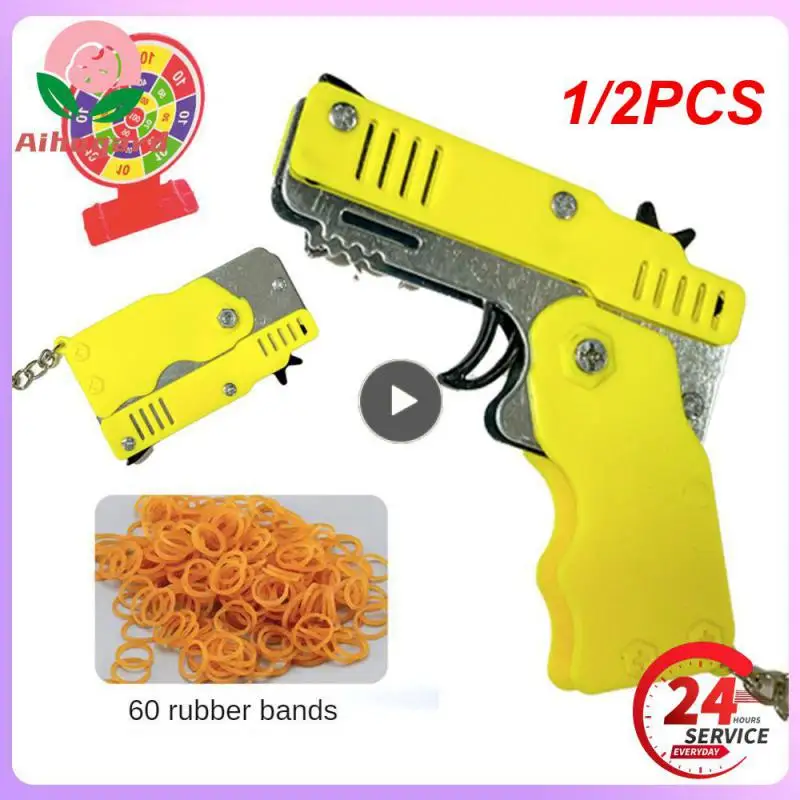 

1/2PCS keychain gun 60 rubber bands rubber band gun Shooting Pistol Alloy Kid Outdoor Party metal gun gift boyfriend Gift Funny
