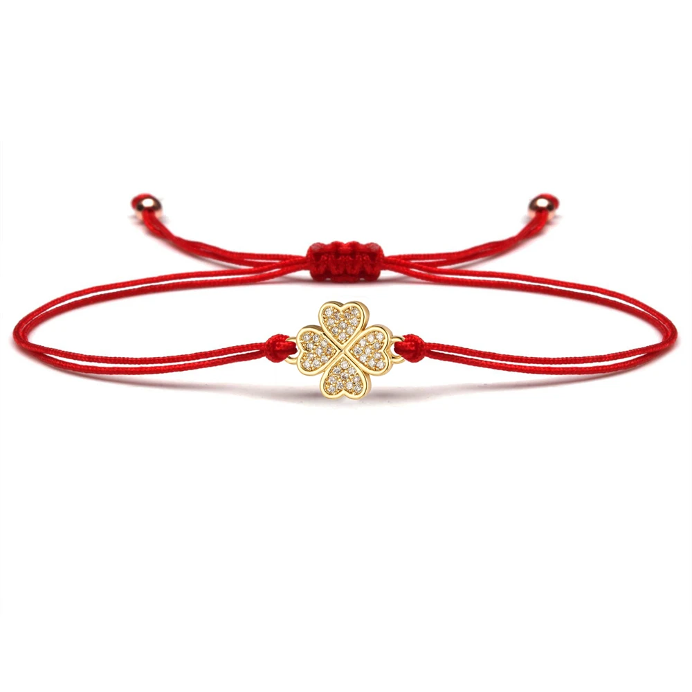 Трендовый браслет с подвесками в виде четырехлистного клевера из фианита