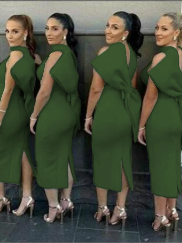 Женское платье с бантом на спине темно-зеленое облегающее без рукавов для