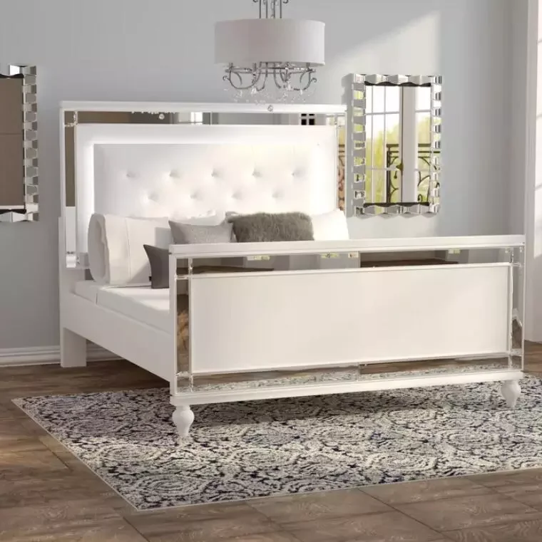 

Mirrored Upholstered Bed solid rubberwood wood with an ivory finish and upholstered in white faux leather built-in LED light