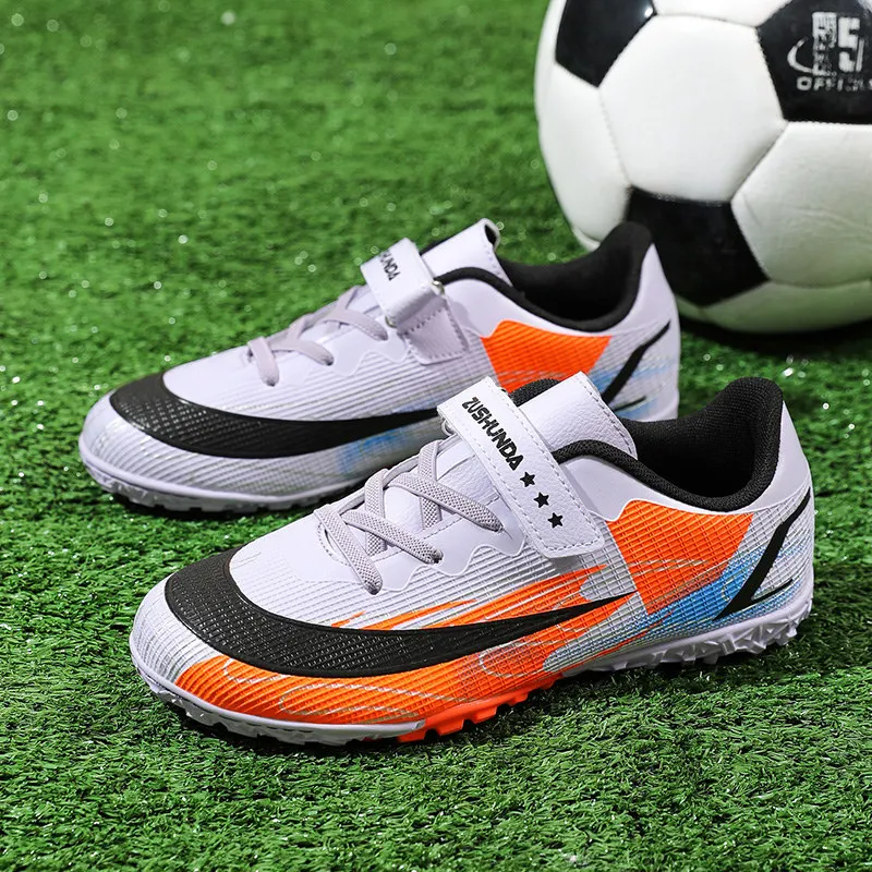 2023 Fashion Red Children Football Shoes Turf Non-slip Kid's Soccer Boots Light Breathable Kids Futsal Shoes zapatos futbol niño