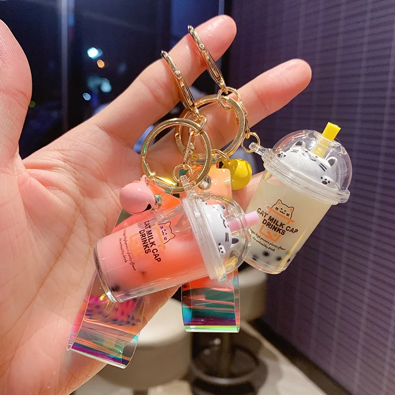 

Cute Cat Milk Tea Cup Keychains Liquid Quicksand Sequin Keychain Cartoon Charm Bag Car Pendant Key Ring Gift For Girl Women