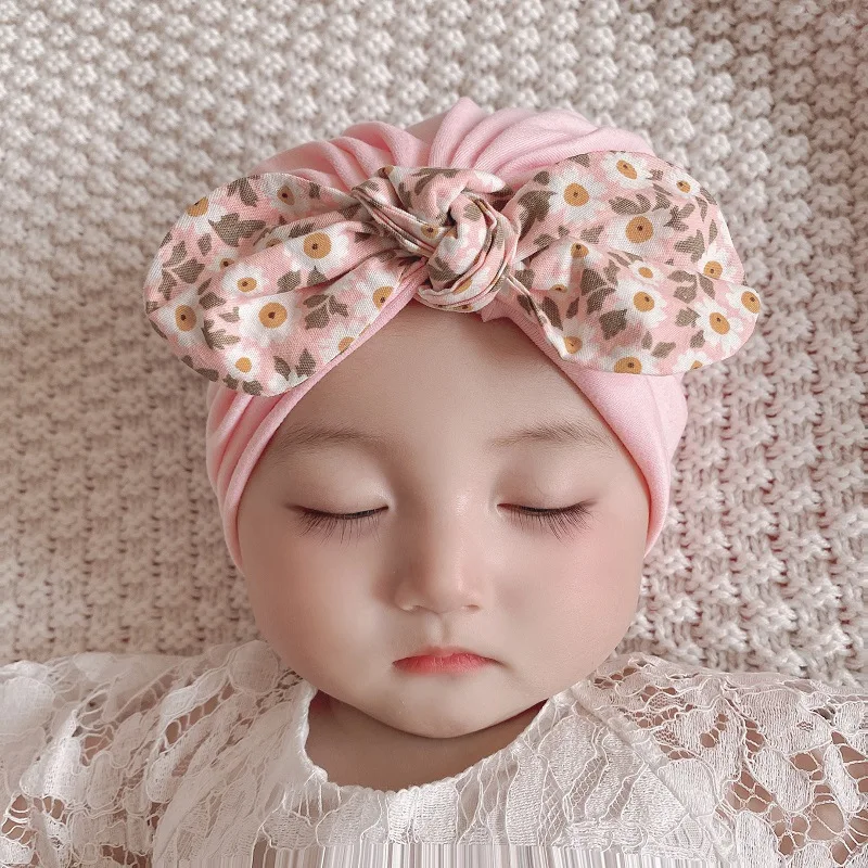 

Flower Print Bow Baby Hat Newborn Bow Beanies Baby Girls Boys Headdress Turban Hats Soft Cotton Skullies for Infant Toddlers Cap