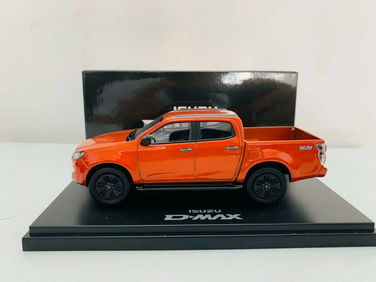 

Isuzu D-Max 4X4 Pick Up Orange 1/43 Scale DieCast Metal Model Car New in Original Box
