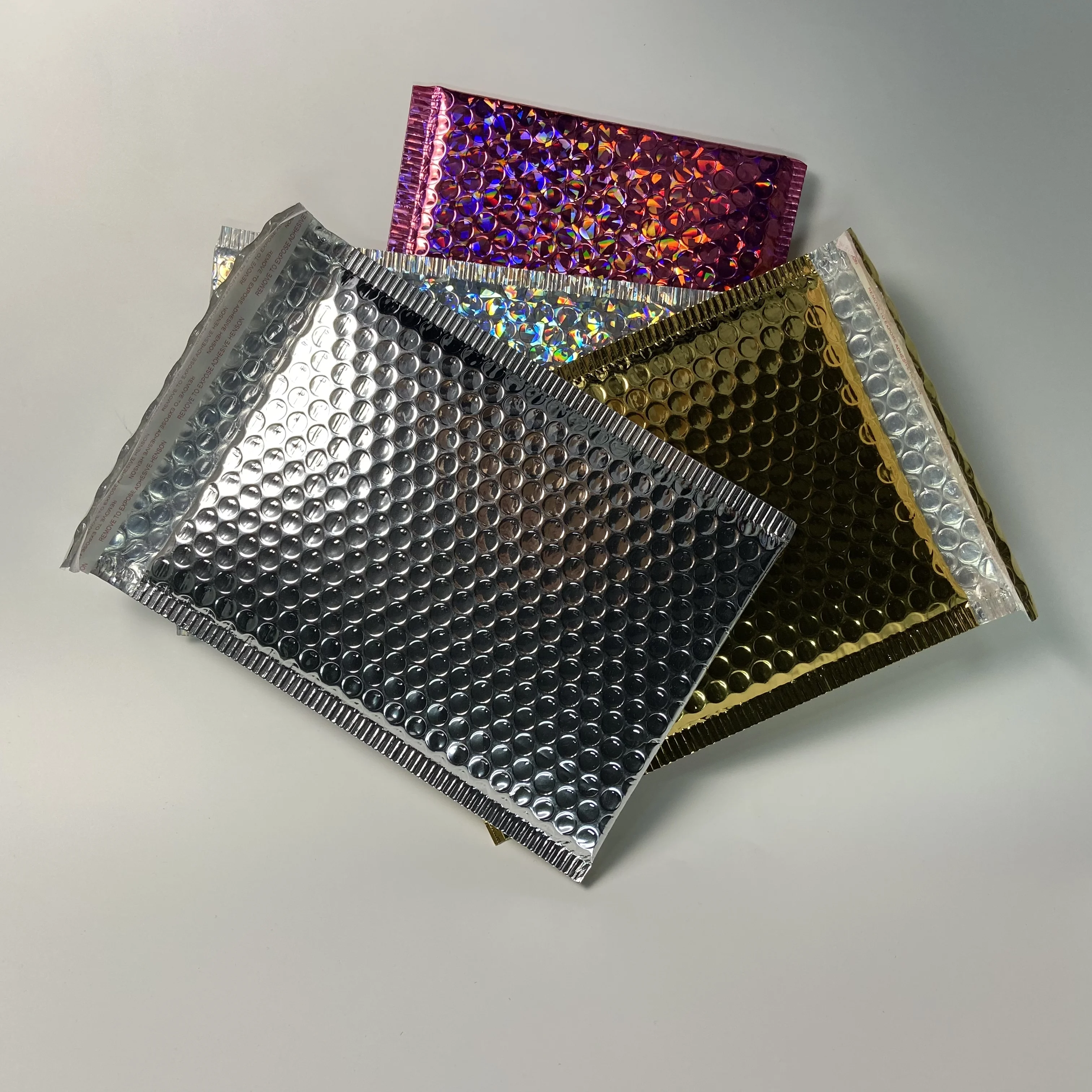 Kup 30 Sztuk Holograficzny Metaliczny Bańka 4 Kolory Mailers Samoprzylepne Wyściełane Koperty Na Przesyłki Poduszki Koperty Cena 30 Sztuk Holograficzny Metaliczny Bańka 4 Kolory Mailers Samoprzylepne Wyściełane Koperty Na Przesyłki Poduszki Koperty