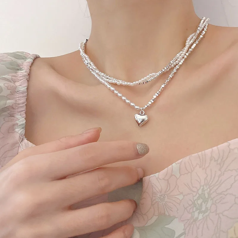 

Baroque pearl necklace women's light luxury niche high sense irregular broken silver clavicle chain millet bead necklace