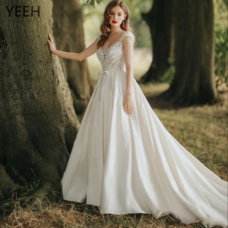 

YEEH V-Neck Cap Sleeves Wedding Dresses For Women Lace Appliques Beaded Bow Bridal Gowns Backless Sweep Train Vestido De Novia