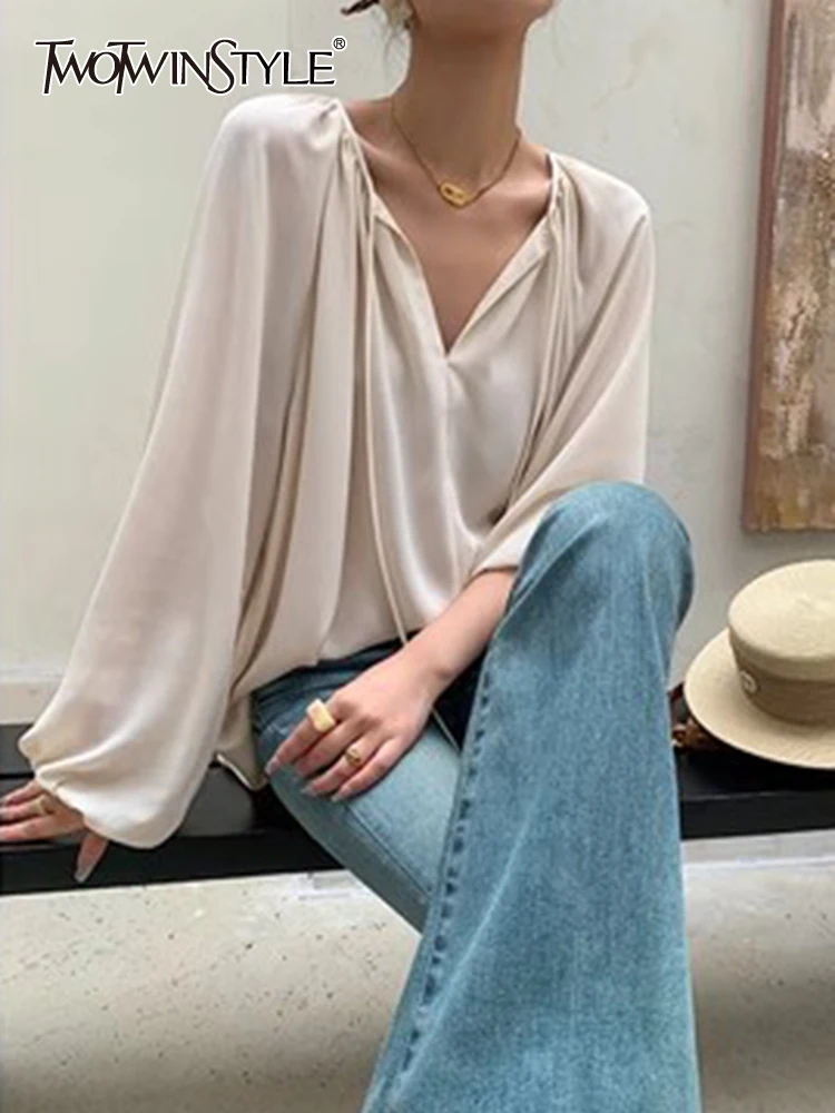 

TWOTWINSTYLE Solid Casual Blouses For Women V Neck Lantern Sleeve Patchwork Lace Up Chic Minimalist Shirt Female Fashion Style