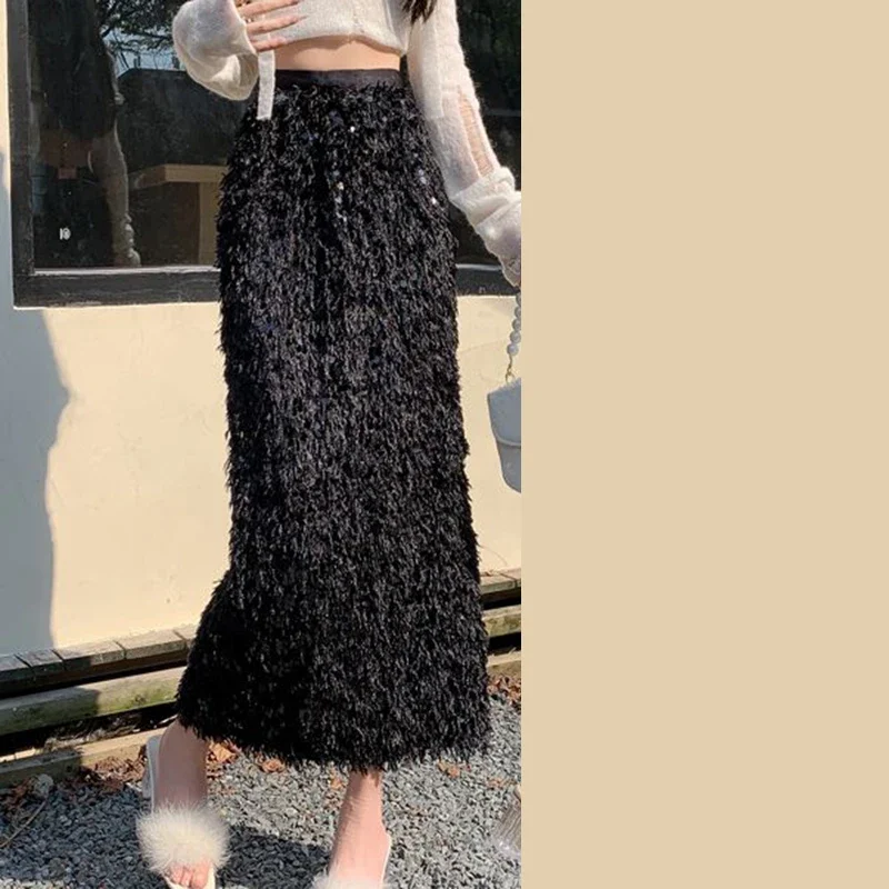 Женская длинная юбка с кисточками и пайетками