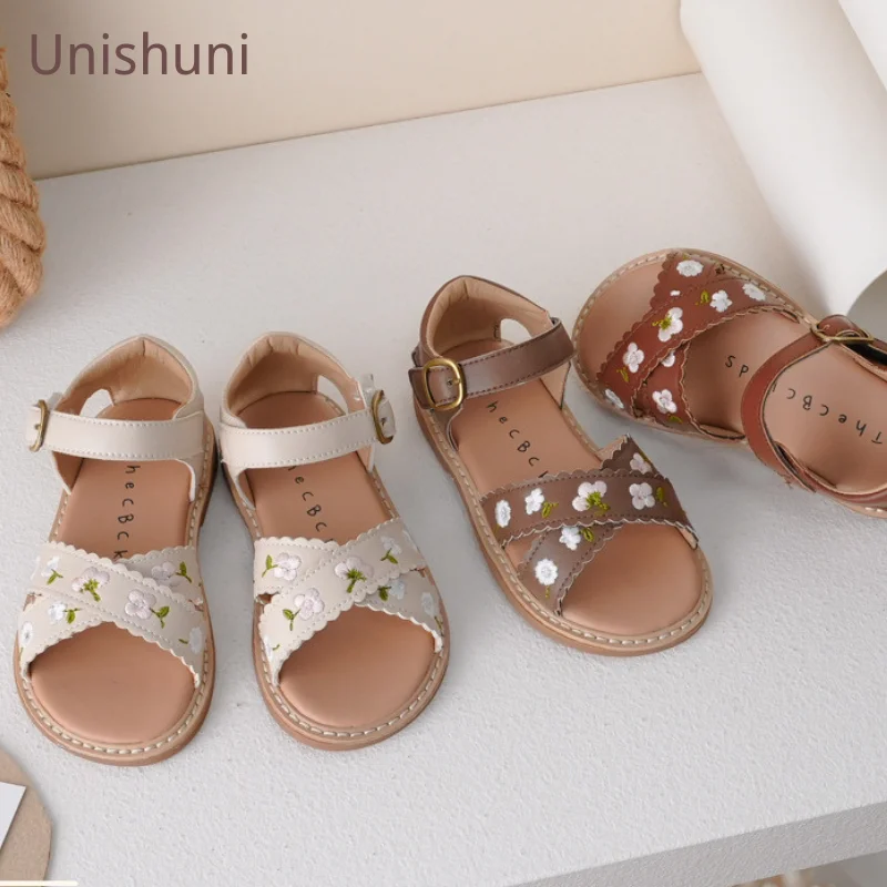 

Unishuni Toddler Girl Gladiator Sandal Kid Vintage Cross Strap Leather Summer Flats Open Toe Beach Shoe Embroidery Floral Sandal