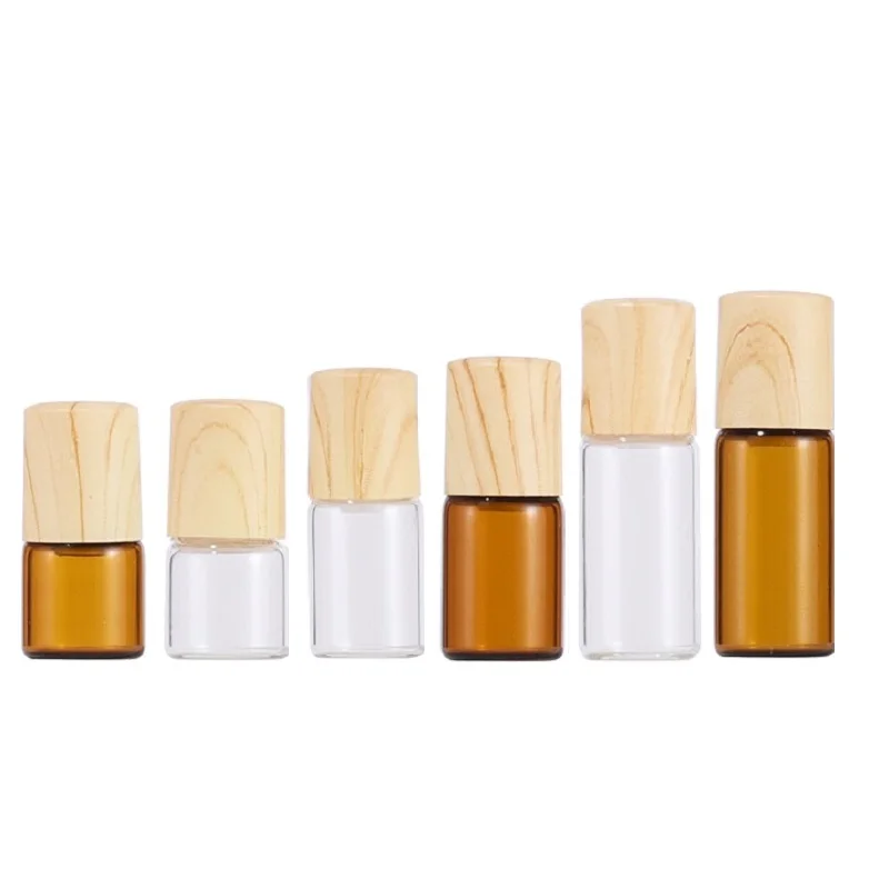 

1ml2ml3ml False Wood Lid Brown Glass Steel Roller Essential Oil Bottle Empty Clear Perfume Roll On Sample Refillable Vials100pcs