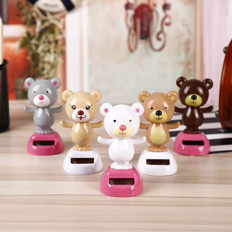 

Cartoon Doll Bear Car Decoration Solar Shaking Head Baby Toy Gift Wholesale Car Accessories For Volkswagen Bmw Honda Ford