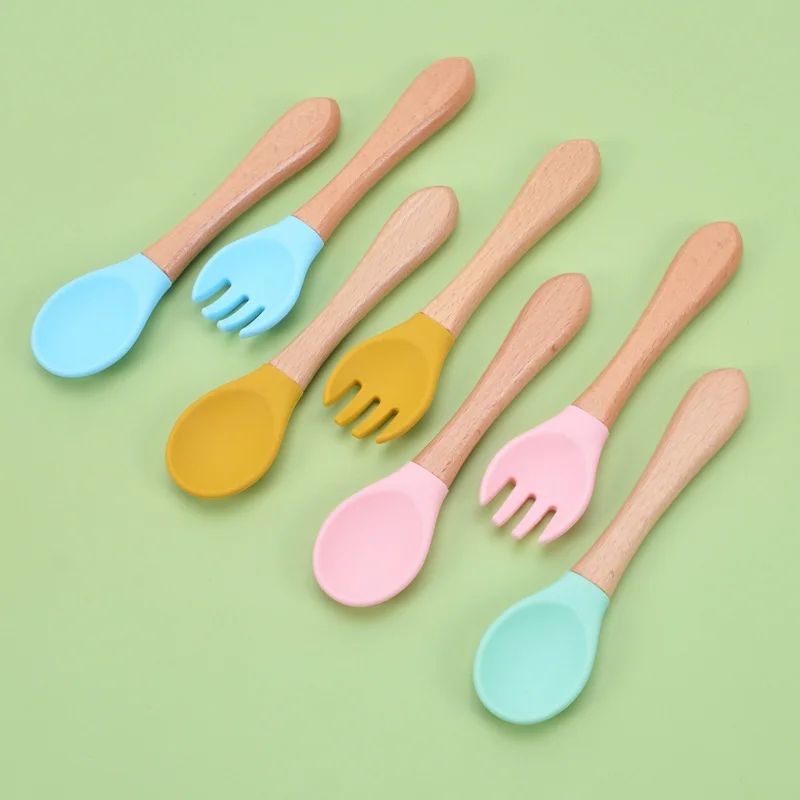 

Baby Feeding Wooden Handle Silicone Spoon Fork Set For Babies Kids Toddlers Utensils Food Eating Training Tableware BPA Free
